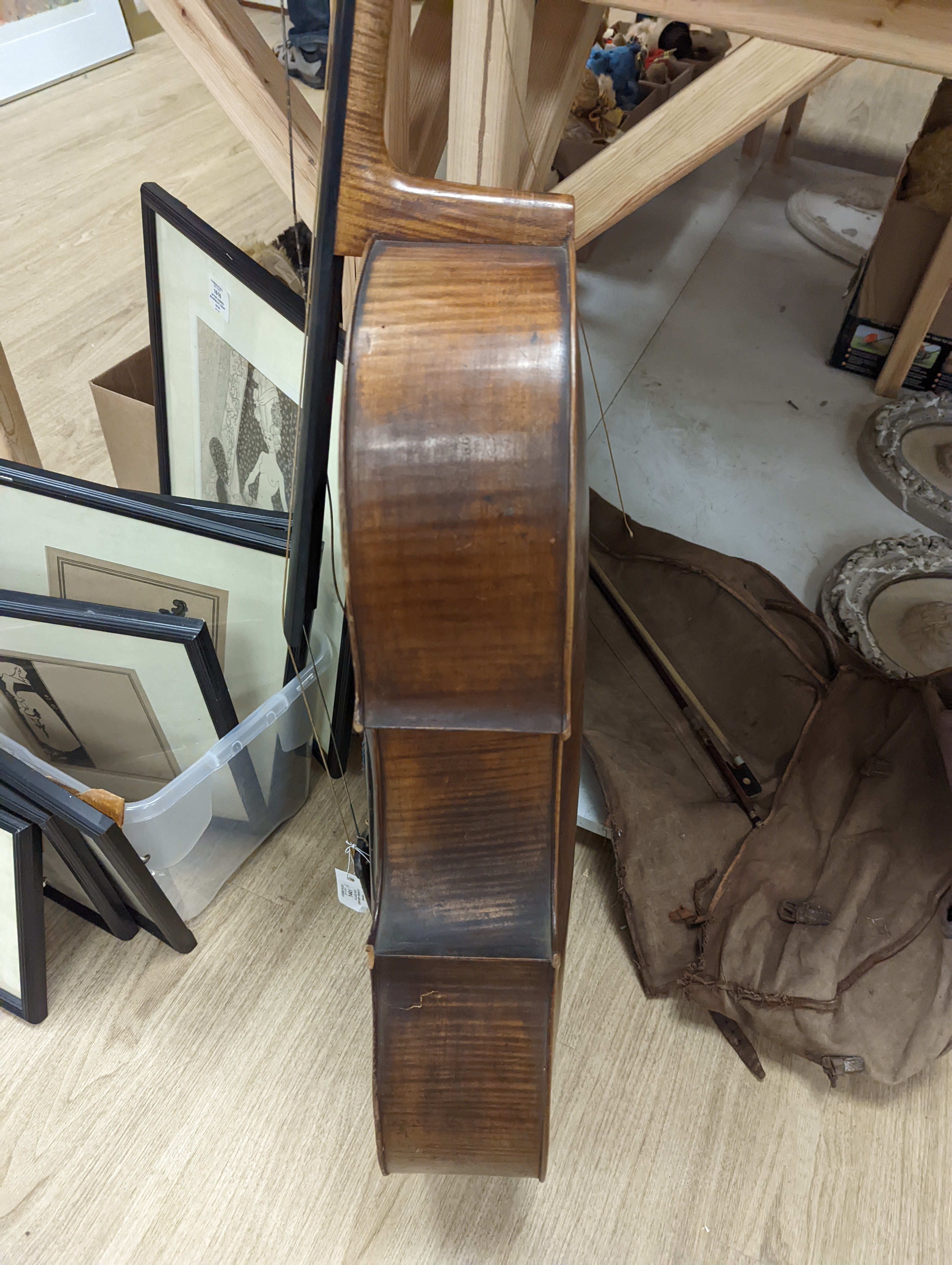 A late 19th century French cello, lob 75.5cm, canvas case with bow